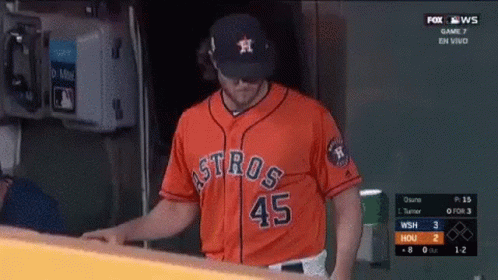 A Baseball Player Wearing A Jersey That Says Astros On It GIF