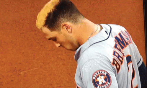 A Baseball Player Wearing A Jersey That Says Braun On It GIF