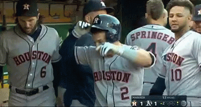A Baseball Player Wearing A Jersey That Says Houston 2 GIF