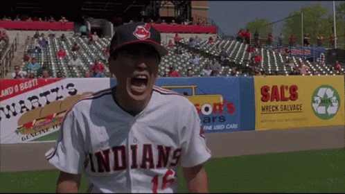 A Baseball Player Wearing A Jersey That Says Indians GIF