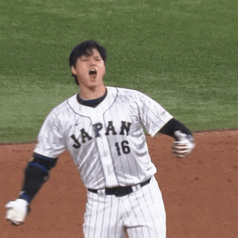 A Baseball Player Wearing A Jersey That Says Japan 16 On It GIF