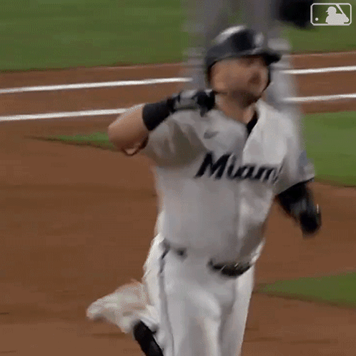 A Baseball Player Wearing A Jersey That Says Miami GIF