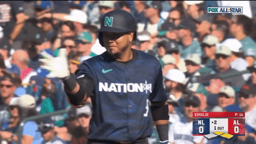 A Baseball Player Wearing A Jersey That Says Nation GIF