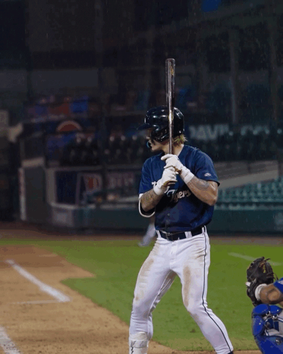 A Baseball Player Wearing A Jersey That Says ' Rays ' On It Is Getting Ready To Bat GIF