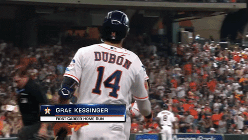 A Baseball Player Wearing A Jersey With The Number 14 On It GIF