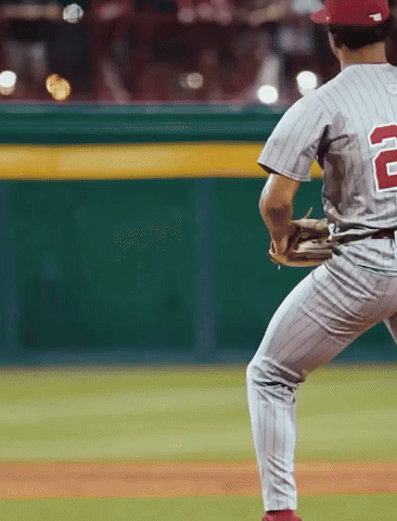 A Baseball Player Wearing A Jersey With The Number 2 On It GIF