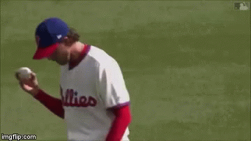 a baseball player wearing a jersey with the number 22 on it