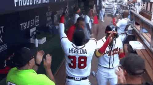 A Baseball Player Wearing A Jersey With The Number 38 On It GIF