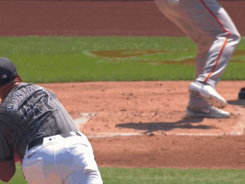 A Baseball Player Wearing A Jersey With The Number 44 On The Back GIF