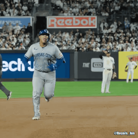 A Baseball Player Wearing A Kansas City Jersey Runs On The Field GIF