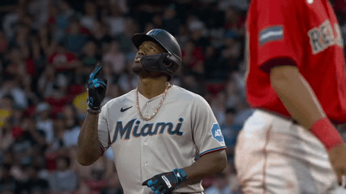 A Baseball Player Wearing A Miami Jersey Looks Up GIF