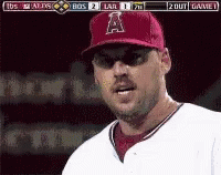 A Baseball Player Wearing A Red A Hat GIF