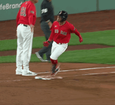 A Baseball Player Wearing A Red And White Jersey With The Word Red Sox On It GIF