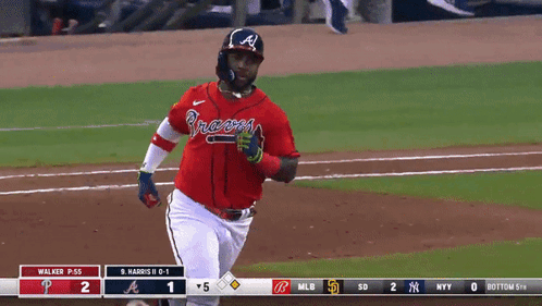 A Baseball Player Wearing A Red Braves Jersey GIF
