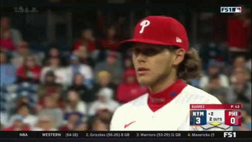 A Baseball Player Wearing A Red Cap With A Letter P On It GIF