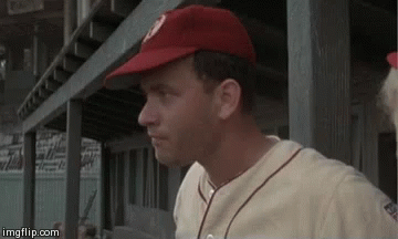 Baseball Player In Dugout Wearing Red Hat And White Jersey GIF