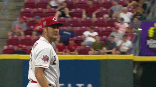 A Baseball Player Wearing A Red Hat With A C On It GIF