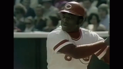 A Baseball Player Wearing A Red Helmet With A C On It GIF