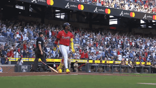 A Baseball Player Wearing A Red Jersey With The Letters A On It GIF