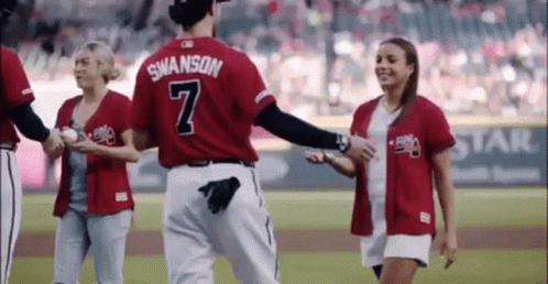A Baseball Player Wearing A Red Jersey With The Number 7 On It GIF