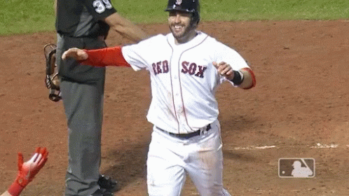 A Baseball Player Wearing A Red Sox Jersey Celebrates A Home Run GIF