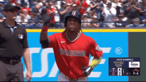A Baseball Player Wearing A Red Uniform That Says Guardians On It GIF