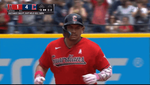A Baseball Player Wearing A Red Uniform With The Word Guardians On The Front GIF