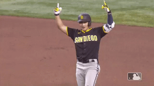 A Baseball Player Wearing A San Diego Jersey Is Standing On The Field . GIF