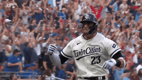 A Baseball Player Wearing A Twin Cities 23 Jersey Is Running On The Field . GIF