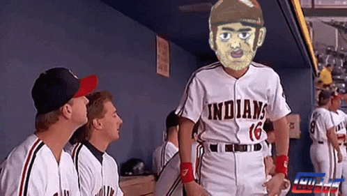 A Baseball Player Wearing A White Indians Jersey GIF