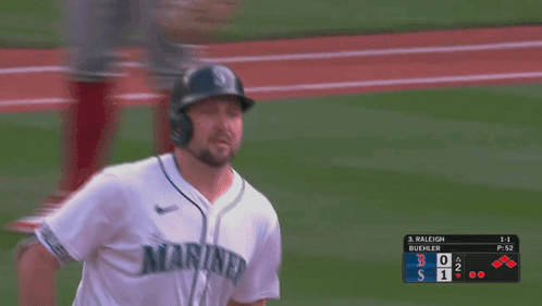 A Baseball Player Wearing A White Jersey That Says Mariner GIF