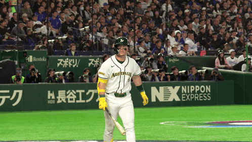 A Baseball Player Wearing A White Jersey With Australia On It GIF