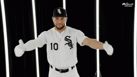A Baseball Player Wearing A White Sox Jersey With The Number 10 On It GIF