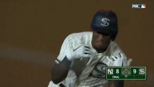 A Baseball Player Wearing A White Uniform With The Letter C On It GIF