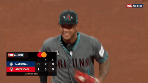 A Baseball Player Wearing An Arizona Jersey Is Running On The Field GIF