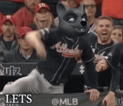 A Baseball Player Wearing An Atlanta Braves Jersey With A Raccoon Mask On His Face GIF
