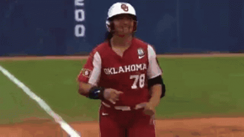 a baseball player wearing an oklahoma jersey with the number 78 on it .