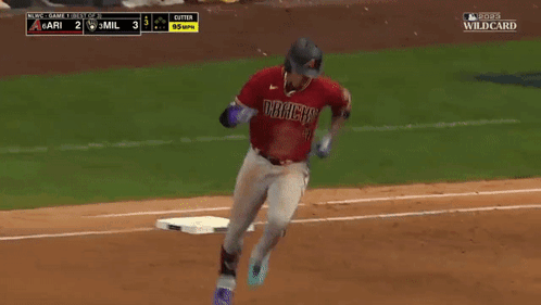 A Baseball Player With Ari On His Jersey Is Running On The Base GIF