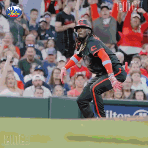 A Baseball Player With Cincy Written On The Bottom Of His Jersey GIF