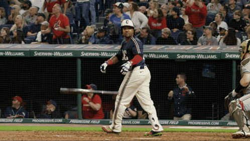 A Baseball Player With The Letter C On His Jersey Stands At Home Plate GIF