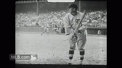 A Baseball Player With The Letter T On His Shirt GIF