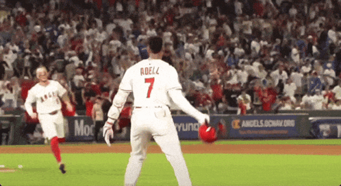 A Baseball Player With The Name Adelz On The Back Of His Jersey GIF