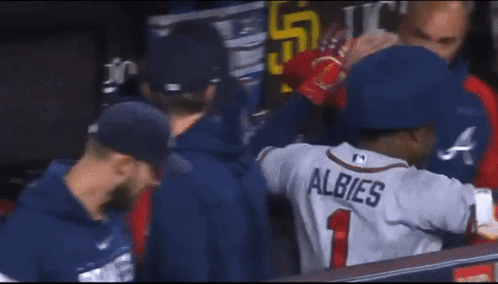 A Baseball Player With The Name Albies On Their Jersey GIF