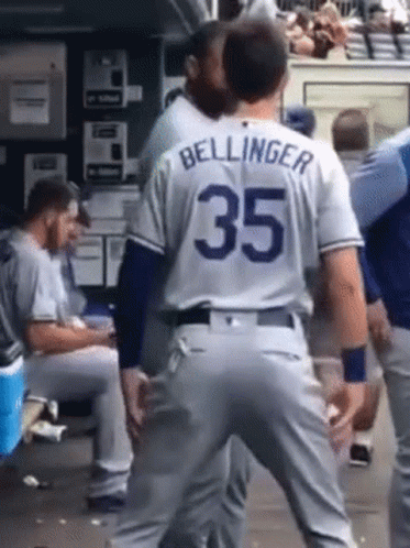 A Baseball Player With The Name Bellinger On His Back GIF
