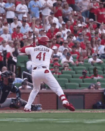A Baseball Player With The Name Burleson On His Back GIF