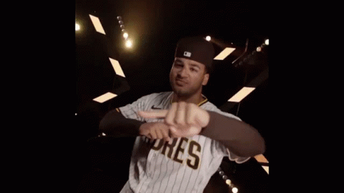 A Baseball Player With The Name Trent Graham Written On The Back Of His Jersey GIF