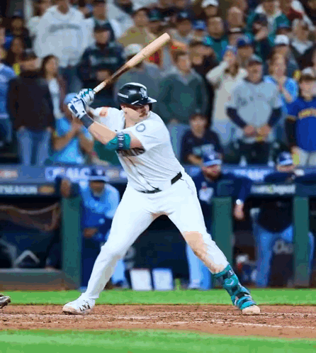 A Baseball Player With The Number 10 On His Jersey Getting Ready To Swing His Bat GIF