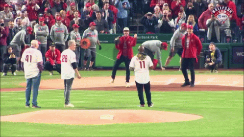 A Baseball Player With The Number 11 On His Back GIF
