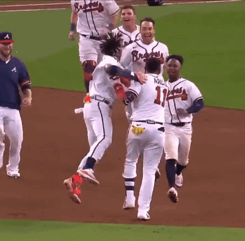 A Baseball Player With The Number 11 On His Back GIF