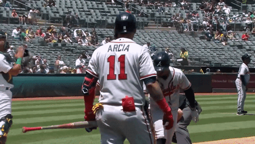 A Baseball Player With The Number 11 On His Jersey GIF